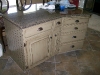 Oak kitchen island with millstone green van dyke brown heavy glaze